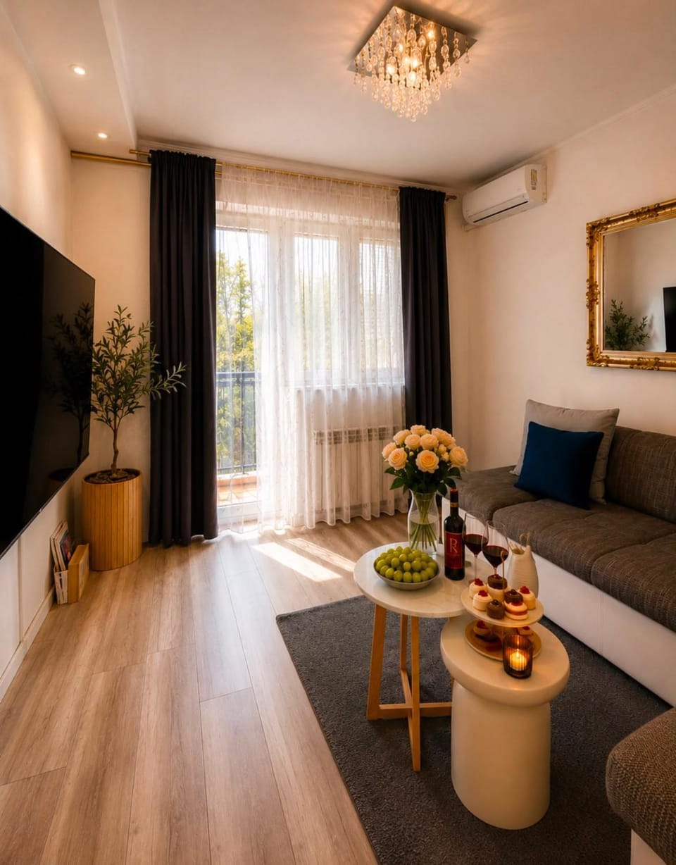 Bed, TV and multimedia, Living room, Seating area, air conditioner