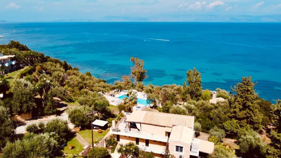 Property building, Day, Natural landscape, Pool view, Sea view