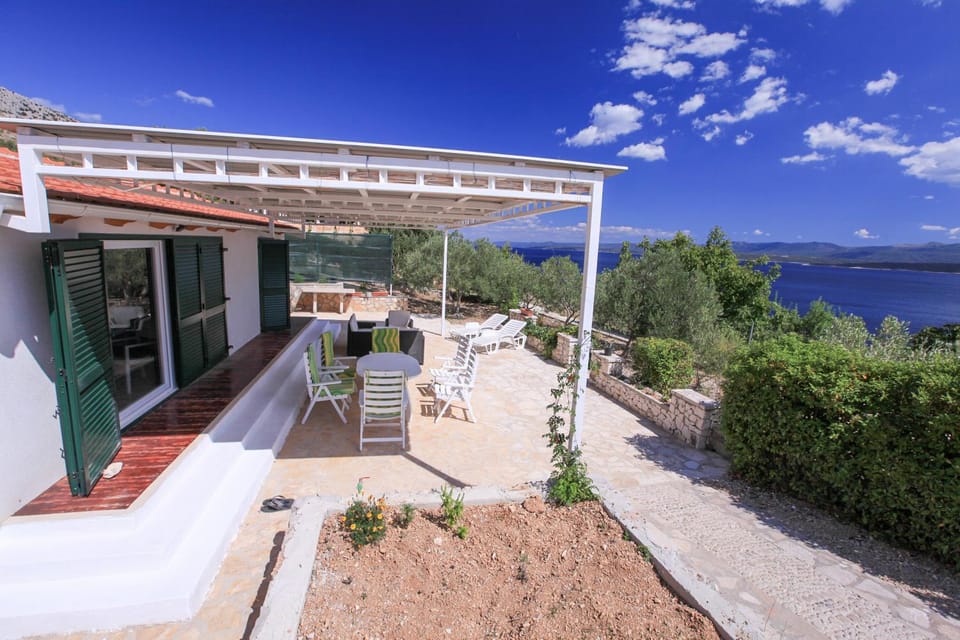 Property building, Facade/entrance, BBQ facilities, View (from property/room), View (from property/room), Balcony/Terrace, Balcony/Terrace, Other, Other, Seating area, Mountain view, Mountain view, Sea view, Sea view, Area and facilities