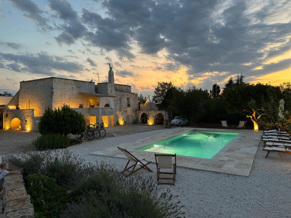 Property building, Day, Natural landscape, Pool view, Swimming pool, Sunrise, Sunset, sunbed