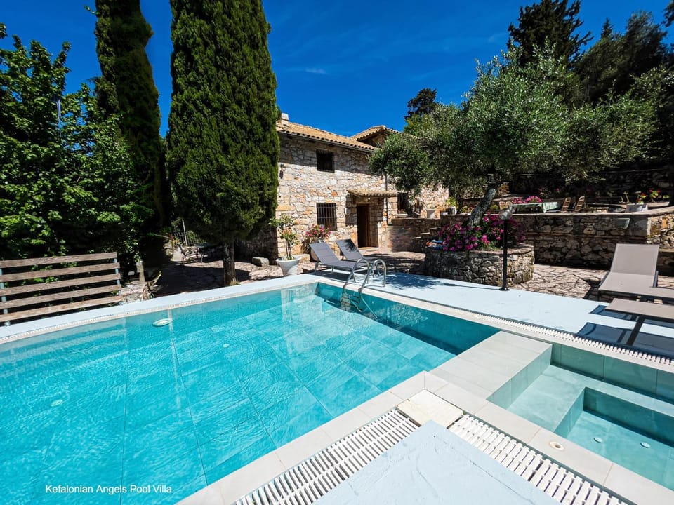 Property building, Natural landscape, Pool view, Swimming pool, sunbed