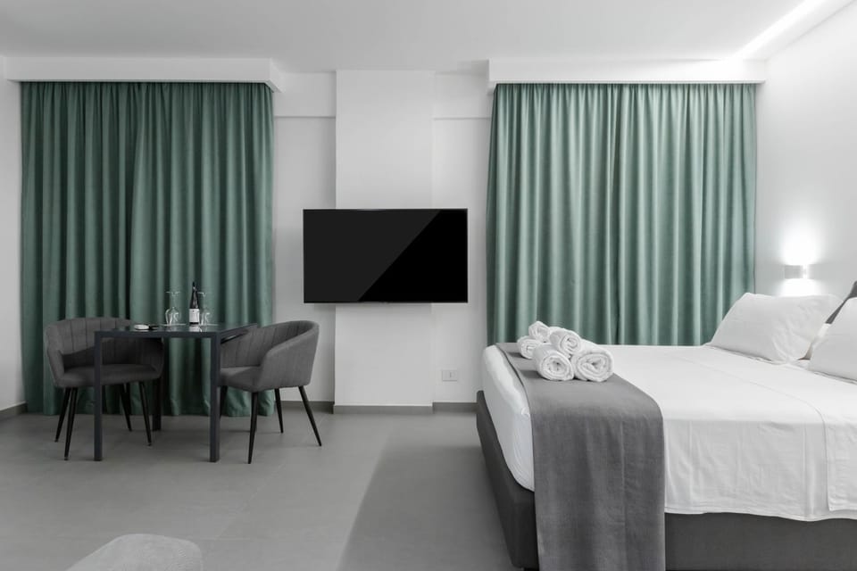 Bed, TV and multimedia, Seating area, Bedroom, hair dresser