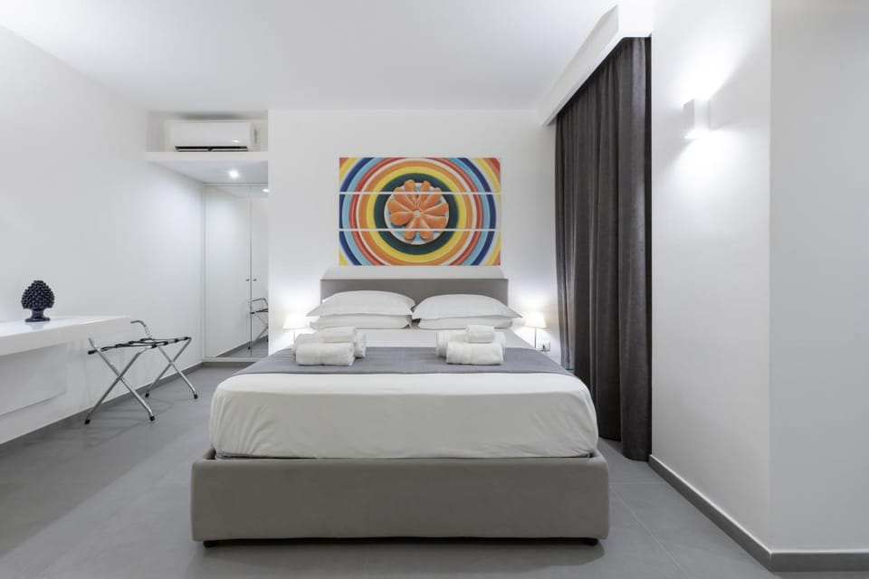 Bed, Bedroom, towels, wardrobe, air conditioner