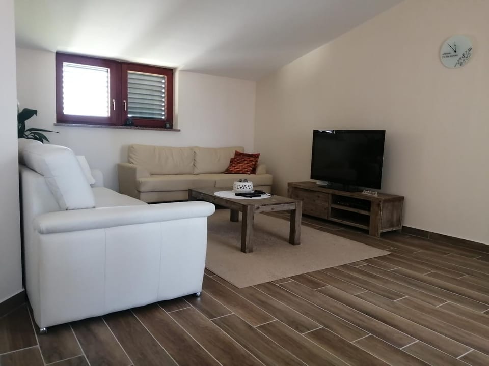 TV and multimedia, Living room, Seating area, Garden view, Pool view, Sea view