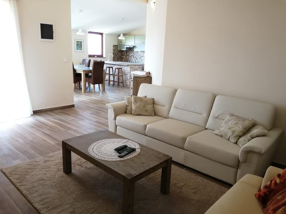 TV and multimedia, Living room, Seating area, Pool view, Sea view