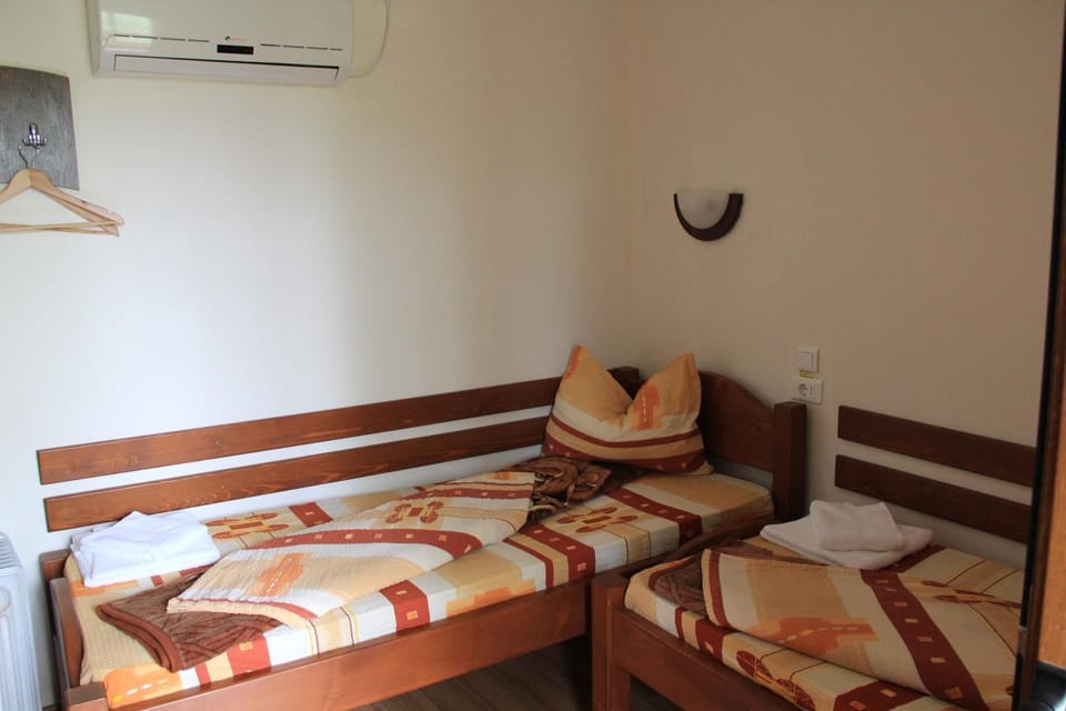 Photo of the whole room, Bedroom, towels, air conditioner