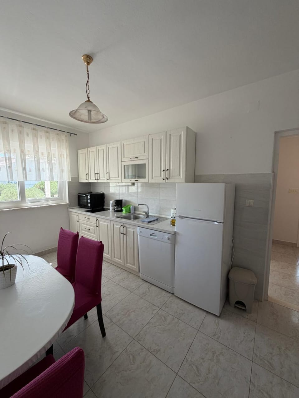 Kitchen or kitchenette, Dining area, dishwasher, oven, stove, toaster