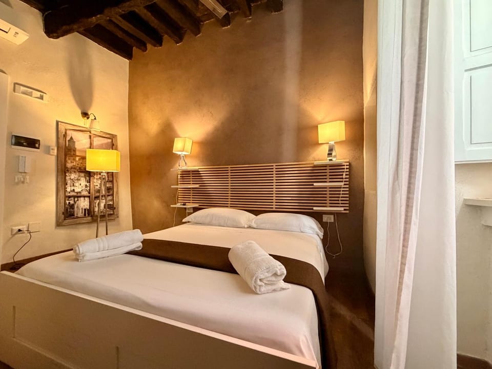 Bed, Photo of the whole room, Bedroom, towels, air conditioner