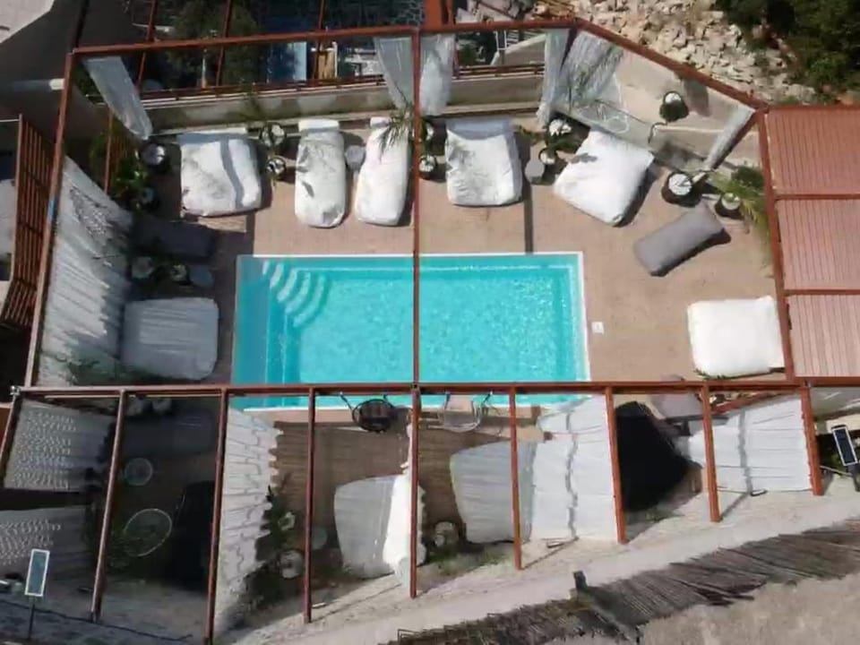 Property building, Patio, Day, View (from property/room), Balcony/Terrace, Pool view, Swimming pool