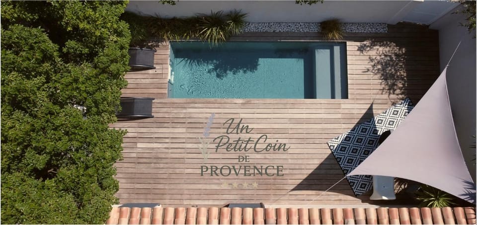 Day, View (from property/room), Balcony/Terrace, Text overlay, Swimming pool