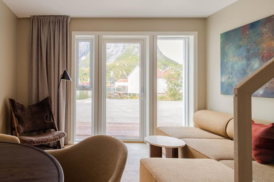 View (from property/room), Living room, Seating area, Mountain view, Sea view