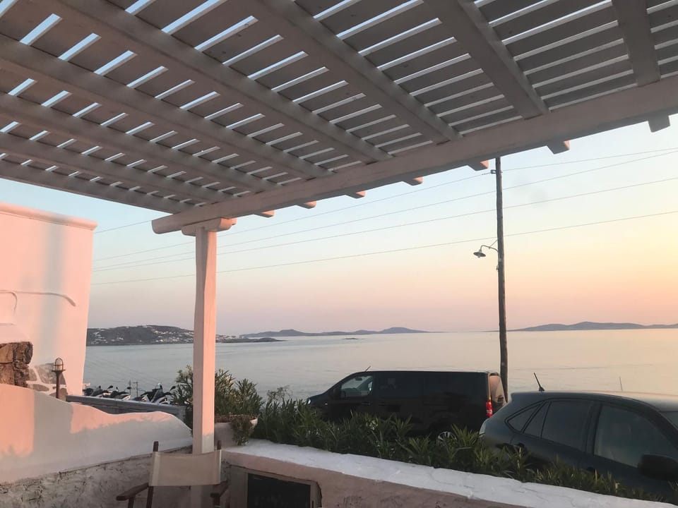 Mykonos Beachfront House with Sunset & Delos View House in Mykonos, Mikonos 846 00, Greece