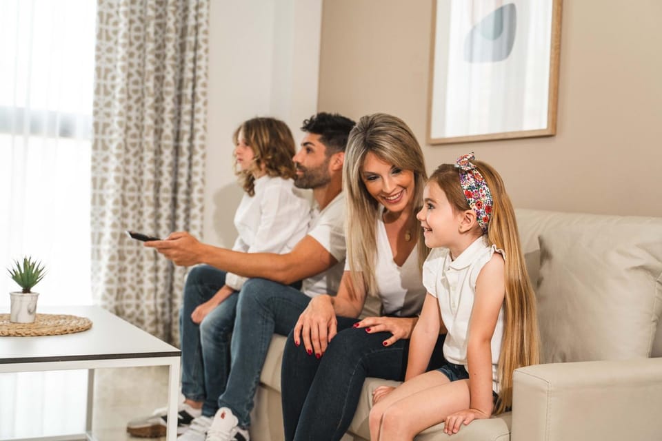 People, TV and multimedia, Living room, Seating area, children, group of guests, Family