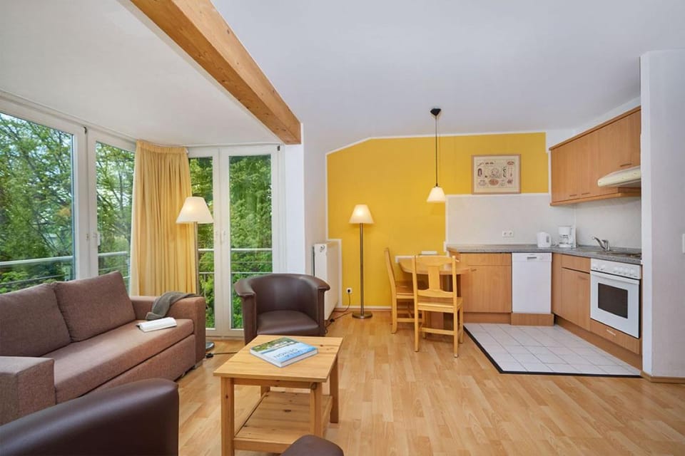 Kitchen or kitchenette, Living room, Seating area, Dining area