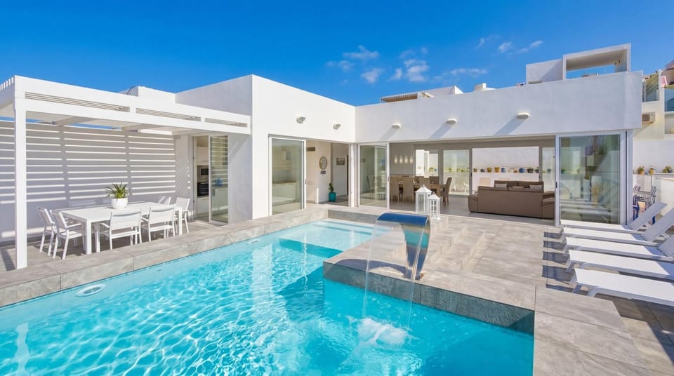 Property building, Patio, Day, Living room, Seating area, Pool view, Swimming pool, sunbed
