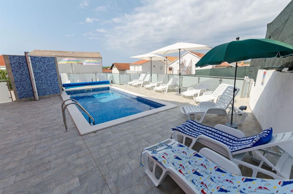 Property building, Day, Pool view, Area and facilities, Swimming pool, sunbed