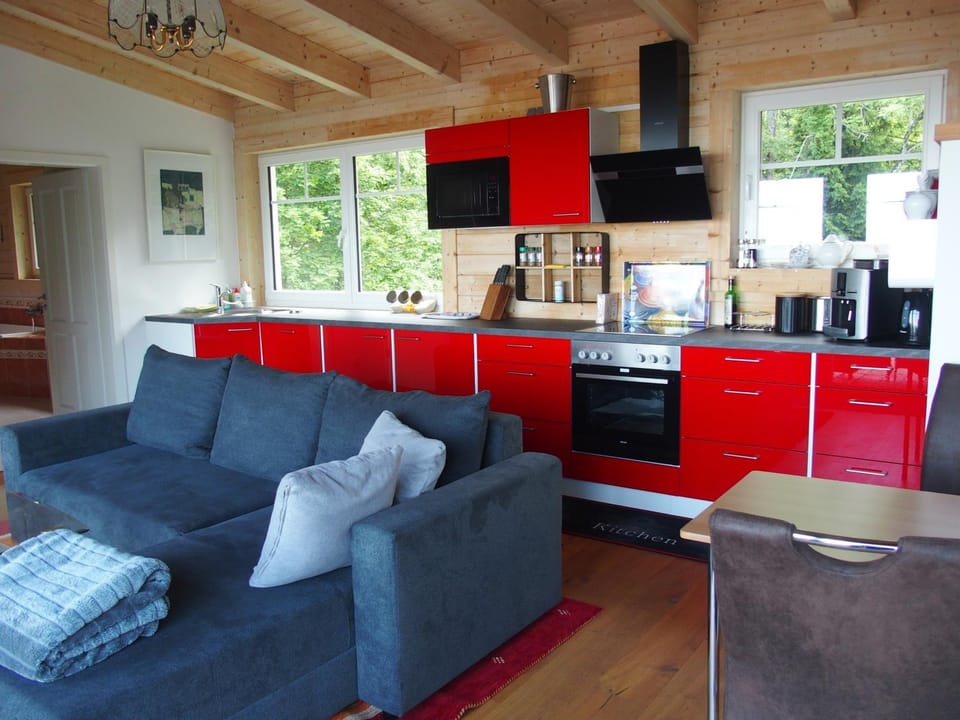 Kitchen or kitchenette, Living room, Seating area, Dining area