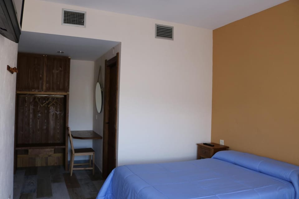 Bed, wardrobe
