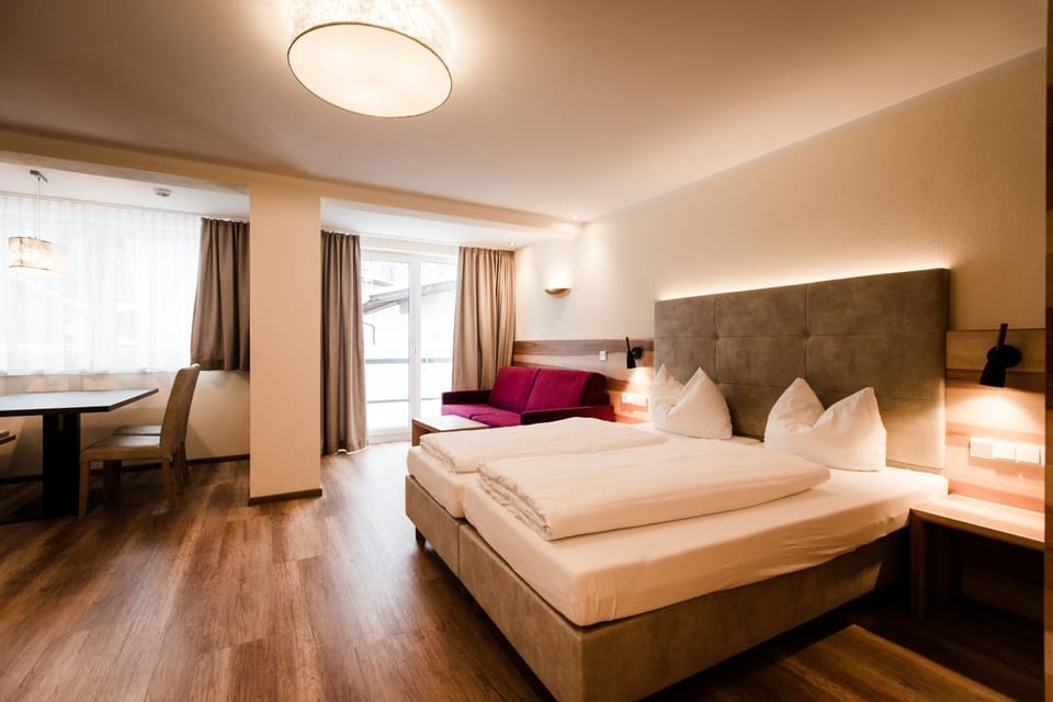 Bed, Living room, Seating area, Mountain view