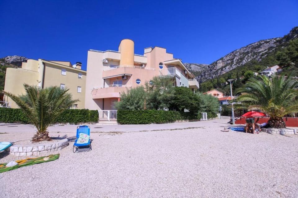 Property building, Natural landscape, Beach, Mountain view