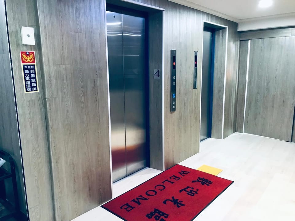 Property building, elevator