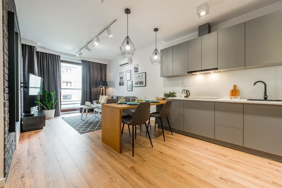 Coffee/tea facilities, Kitchen or kitchenette, Living room, Seating area, oven, stove, air conditioner, air conditioner