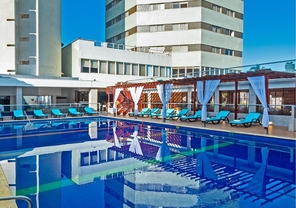 Property building, Day, Floor plan, Pool view, Swimming pool, Swimming pool, sunbed