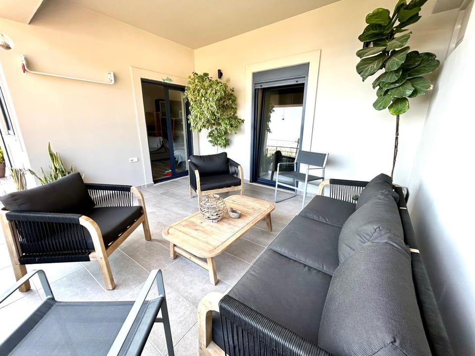 Living room, Seating area, Landmark view, Mountain view, Sea view, Street view