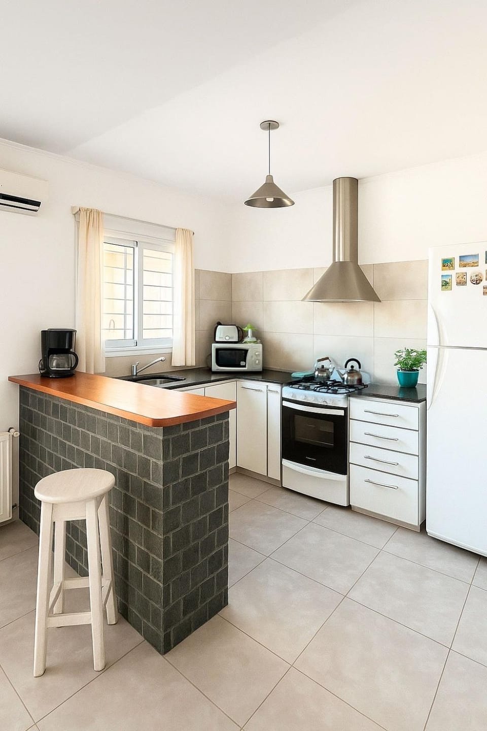 Kitchen or kitchenette, dishwasher, oven, stove