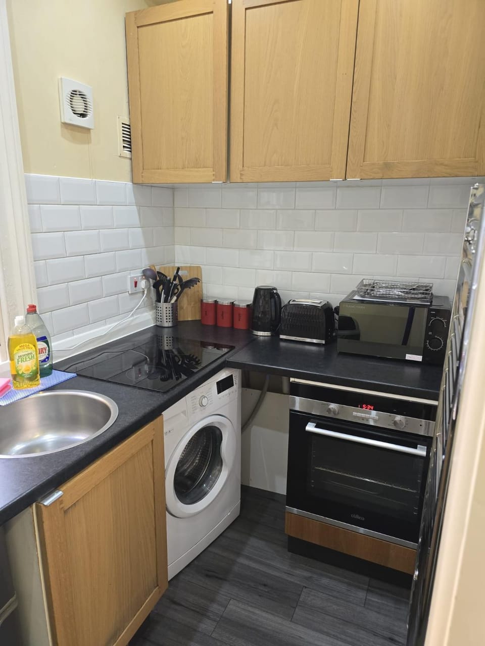 microwave, oven, stove, washing machine, kitchen