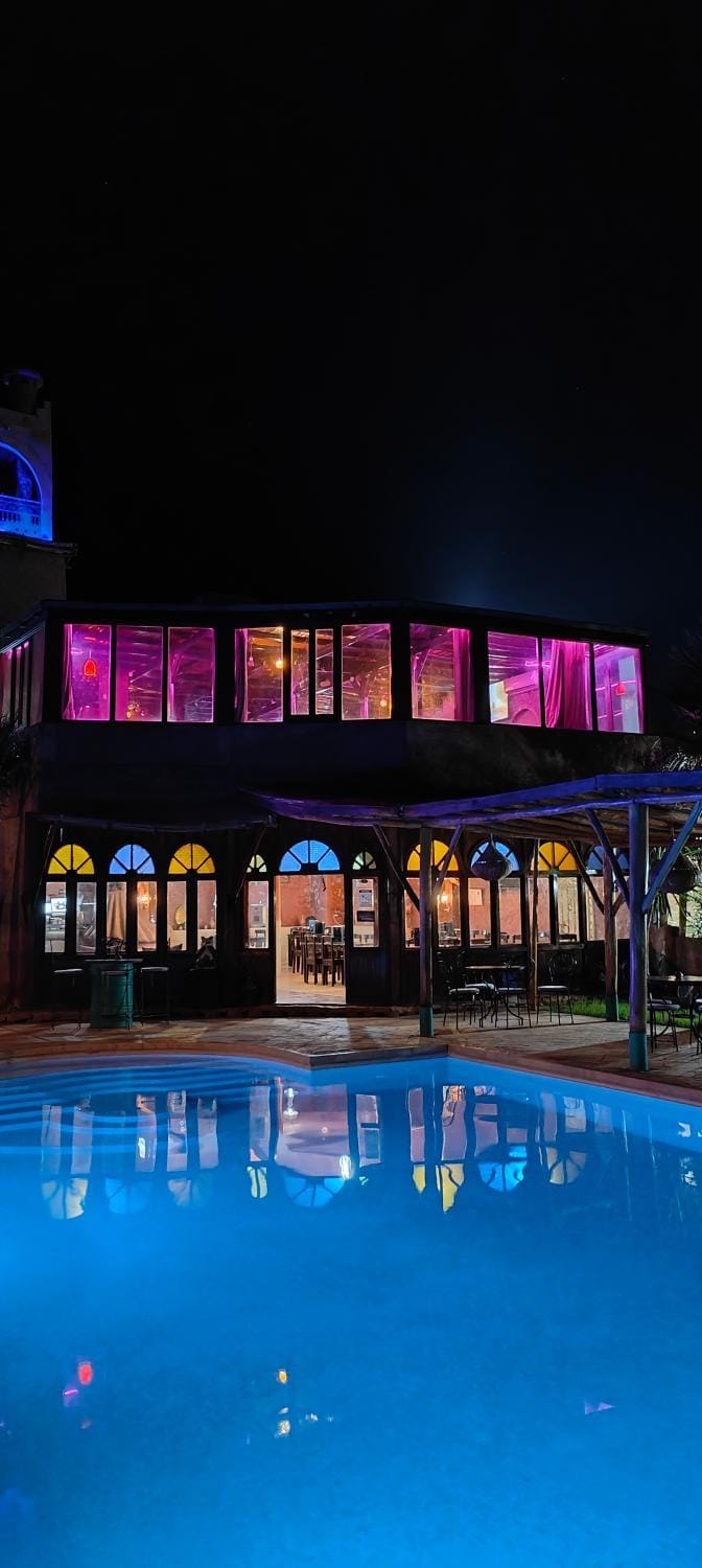 Restaurant/places to eat, Night, Pool view, Swimming pool