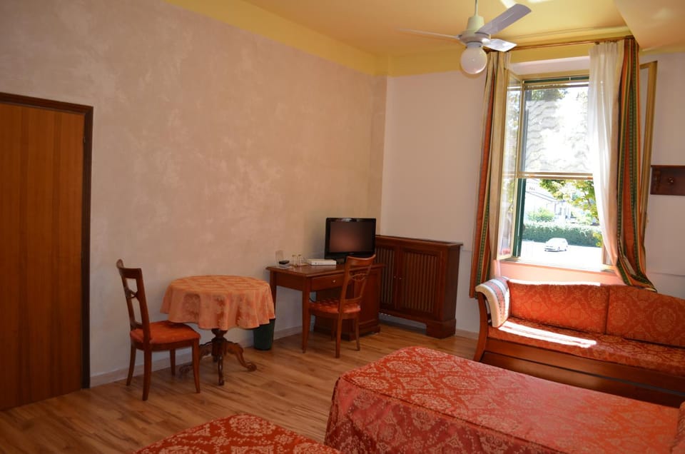 Bed, Living room, Seating area, Bedroom