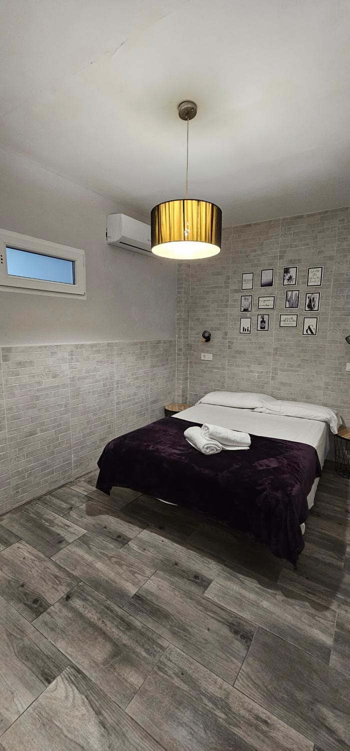 Bed, Photo of the whole room, Bedroom, Inner courtyard view, towels, air conditioner