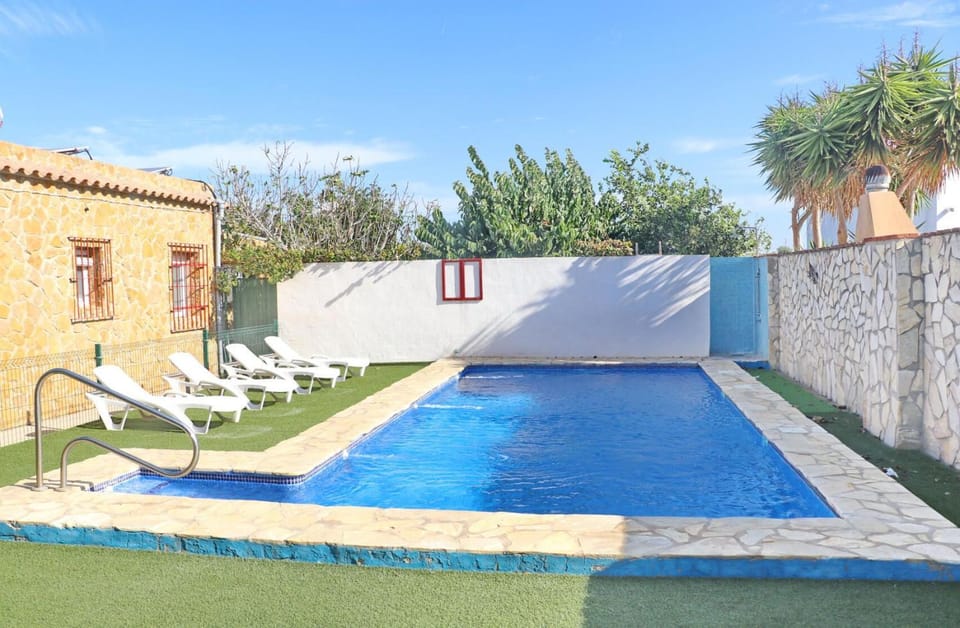 Swimming pool, sunbed