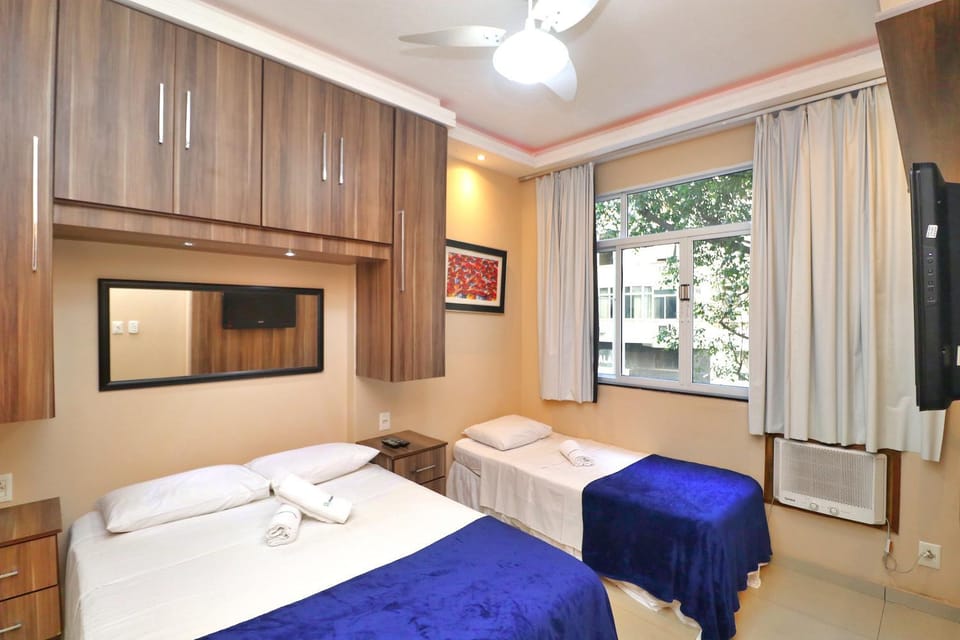 Bed, TV and multimedia, Bedroom, towels, air conditioner