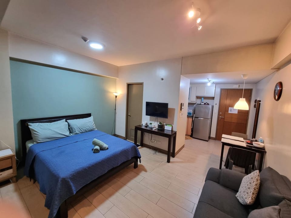 Palm Tree Condos near MNL Airport Terminal 3 by ELR Apartment in Pasay