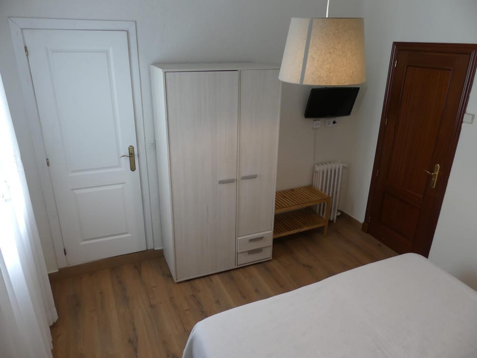 Bed, wardrobe