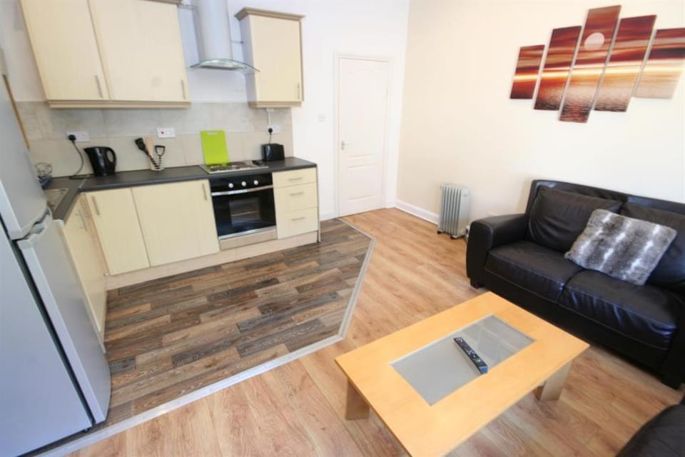 Kitchen or kitchenette, Living room, Seating area, oven, stove
