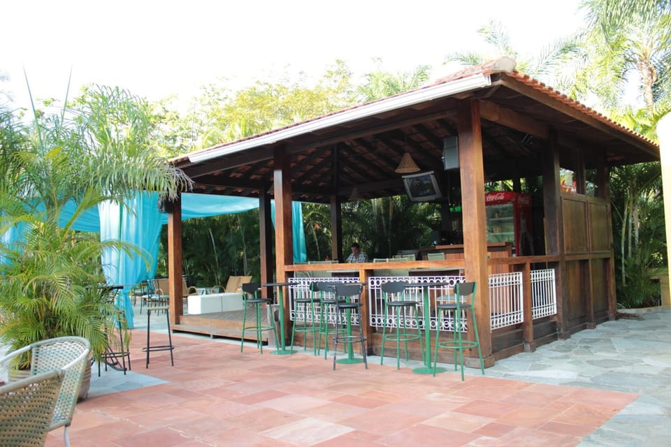 Property building, Activities, BBQ facilities, Game Room, Garden, Squash, View (from property/room), Food and drinks, Other, Decorative detail, Tennis court, Food, Pool view, Swimming pool, Entertainment, Drinks, Alcoholic drinks, Non alcoholic drinks