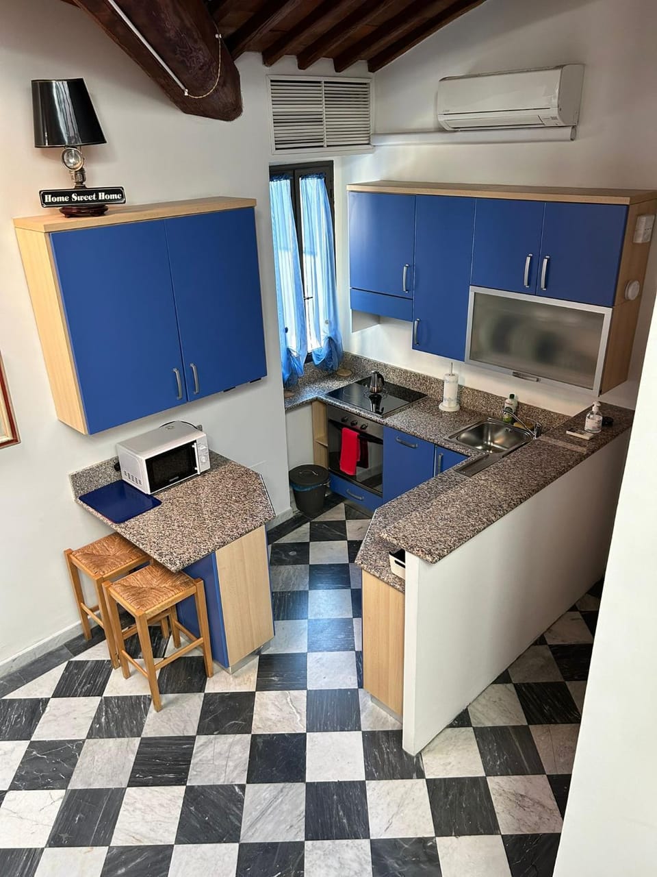Kitchen or kitchenette, Dining area, dishwasher, microwave, oven, stove, air conditioner