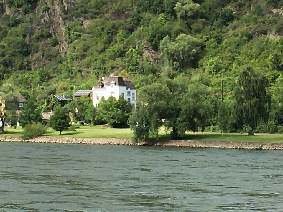 Property building, Nearby landmark, Day, Natural landscape, Mountain view, River view