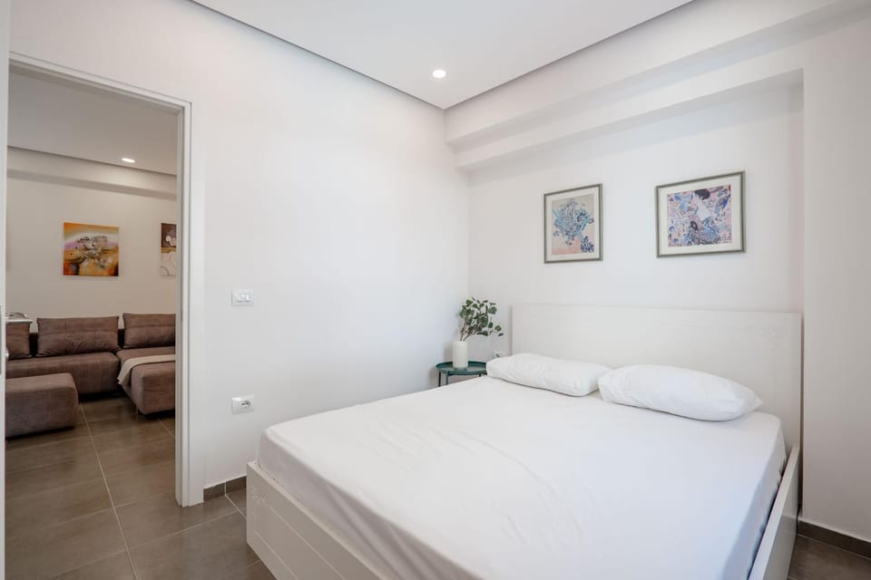 Bed, Living room, Seating area, Bedroom