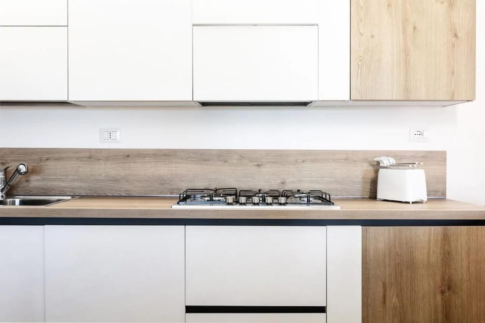 Kitchen or kitchenette, stove
