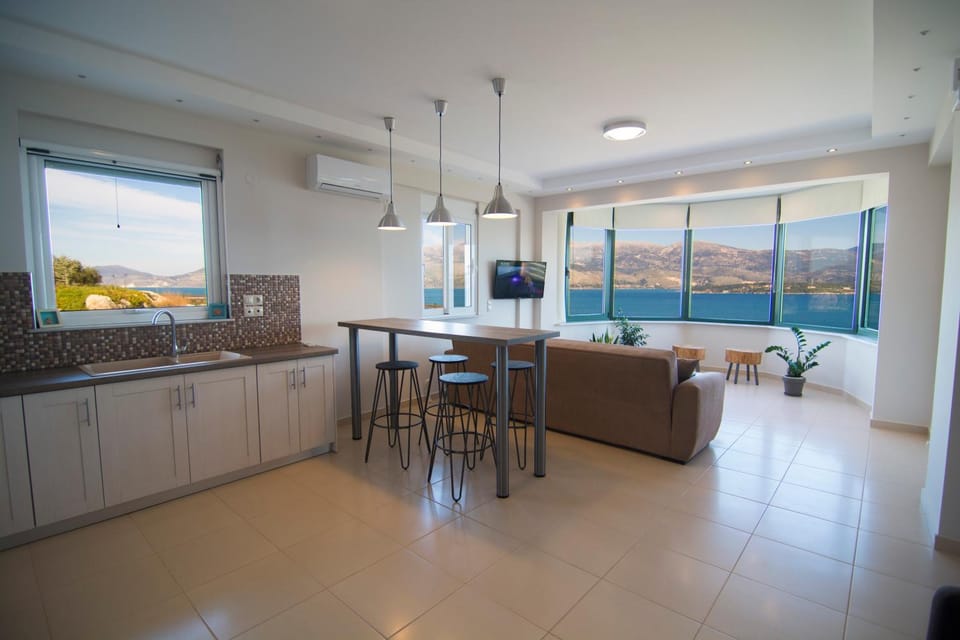 Kitchen or kitchenette, Living room, Seating area, Sea view