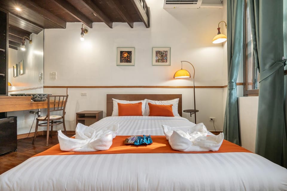 Bed, Photo of the whole room, Bedroom, towels, air conditioner