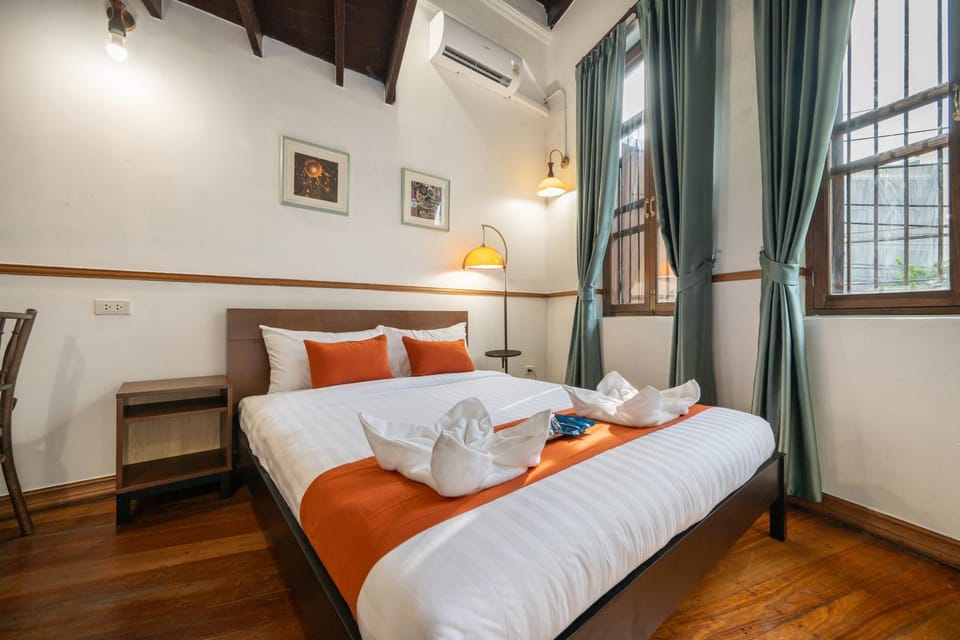 Bed, Photo of the whole room, Bedroom, towels, air conditioner