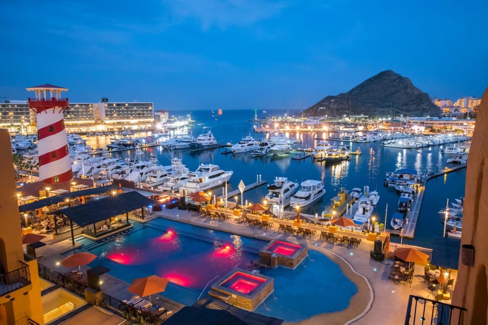 Property building, Nearby landmark, Night, Natural landscape, Activities, Landmark view, Pool view, Sea view, Swimming pool