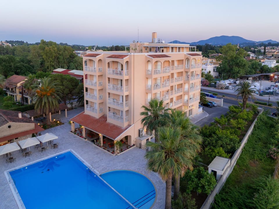 Property building, Natural landscape, Bird's eye view, City view, Pool view, Street view, Swimming pool