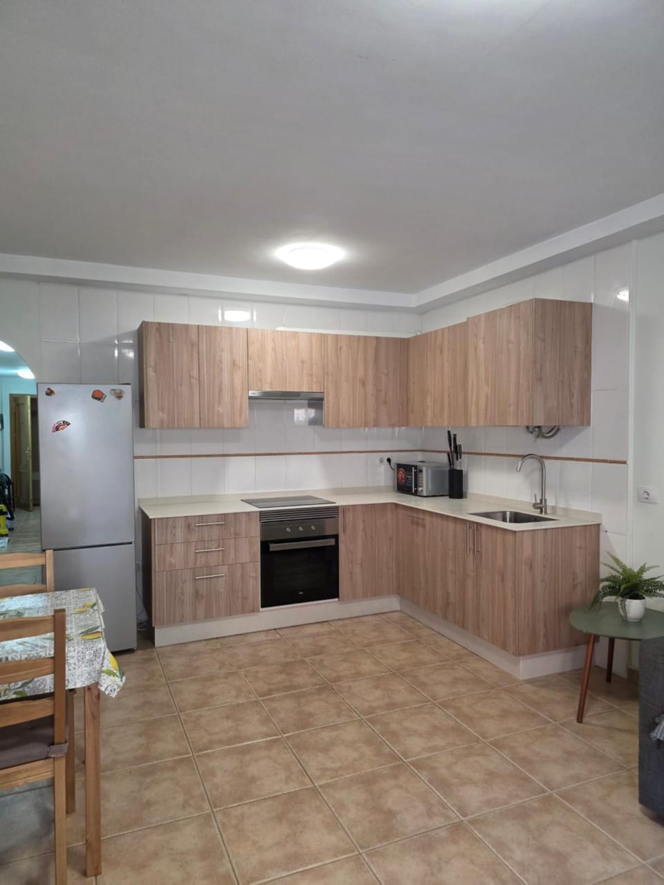 Kitchen or kitchenette, dishwasher, oven, stove, toaster