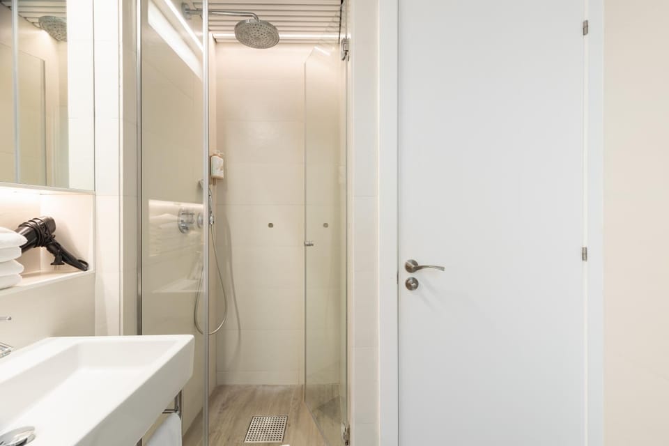 Shower, Bathroom, hair dryier, towels